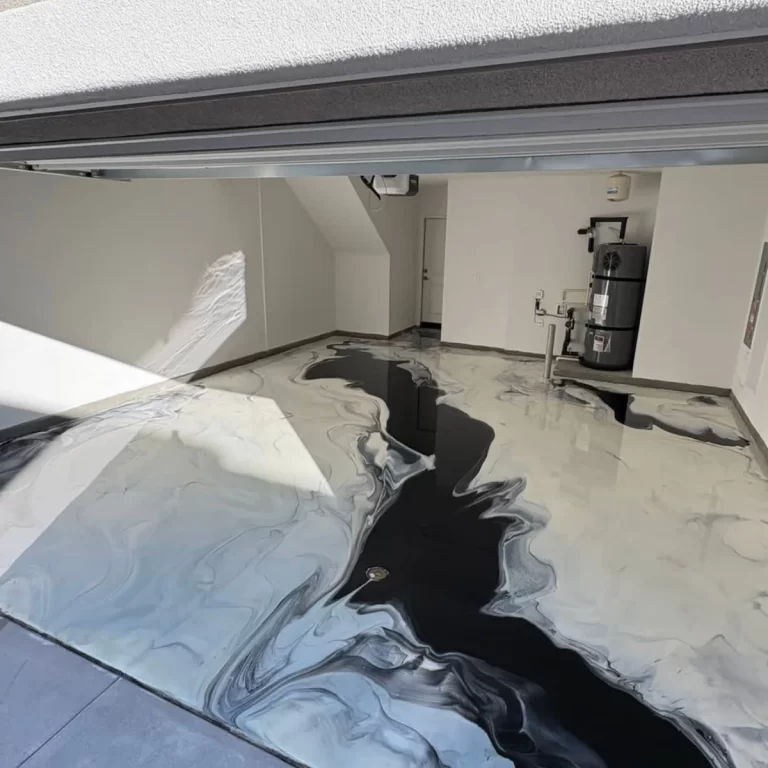 Black and white metallic epoxy garage floor in San Diego