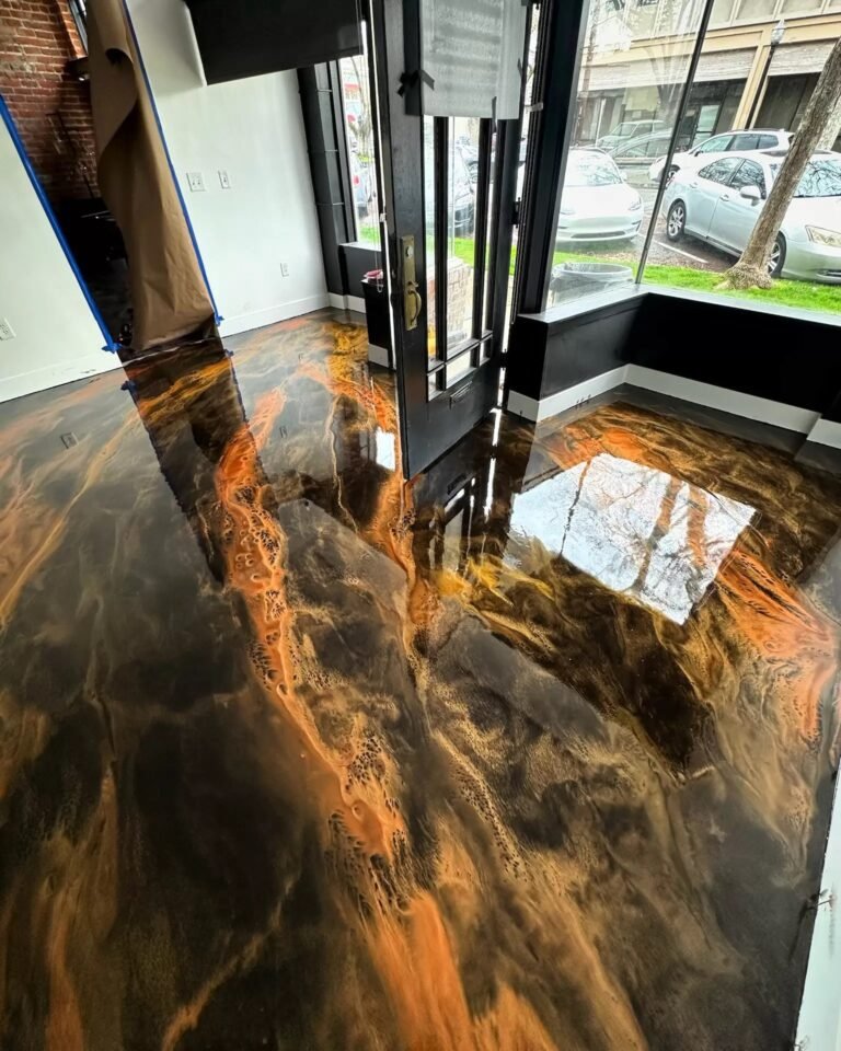 Black, orange and gold metallic epoxy floor in a San Diego commercial interior