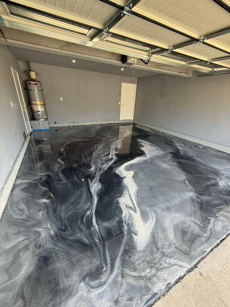 Black, white and gray metallic epoxy garage floor installed in San Diego