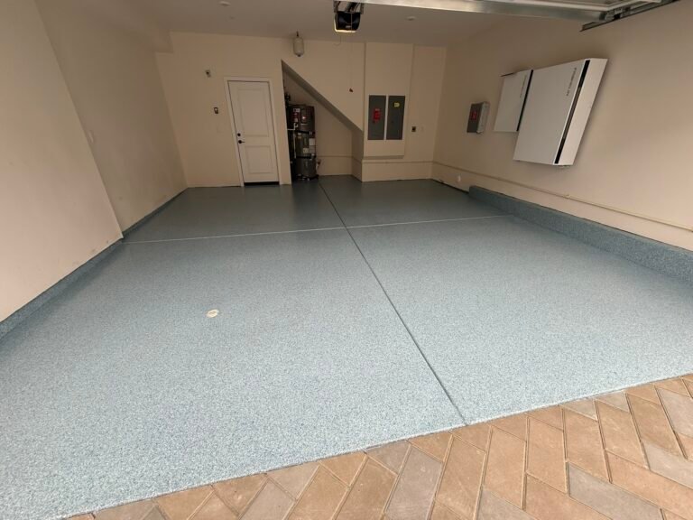 Decorative epoxy flake floor coating on professionally prepared concrete