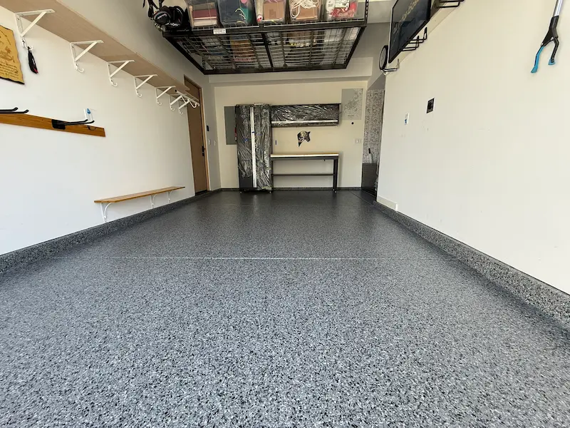 Gray decorative flake epoxy garage floor installed in San Diego County